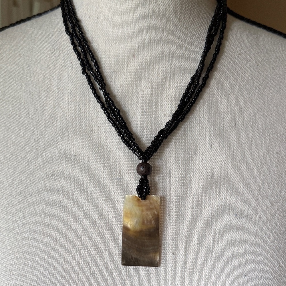 Black Beaded Necklace with Shell Pendant